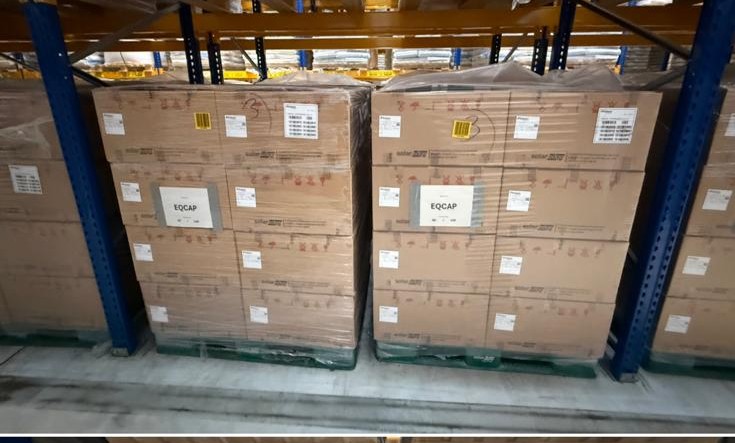 Palletised cell boxes in warehouse racking, second pallet row