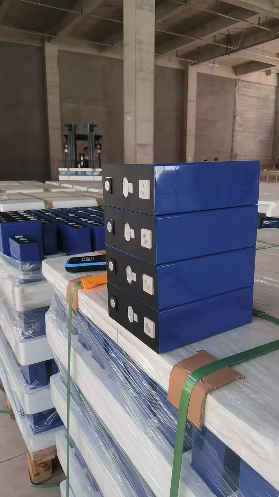 Warehouse stock — stretch-wrapped pallets